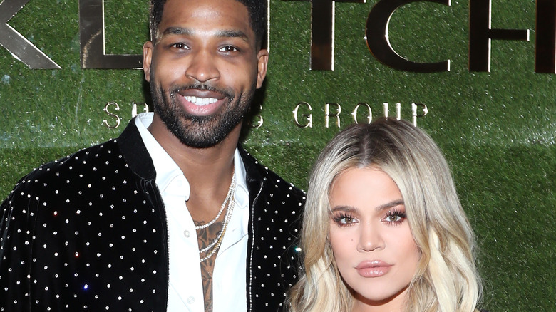 Tristan Thompson and Khloe Kardashian at an event