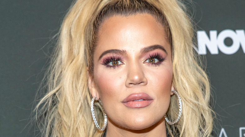 Khloé Kardashian with a high ponytail