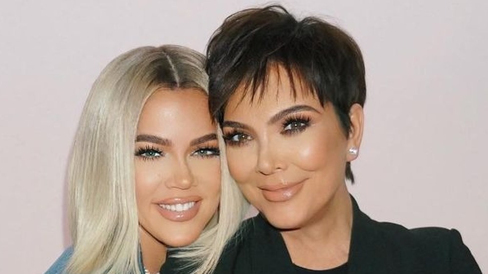 Khloe Kardashian cuddles up to mother Kris Jenner
