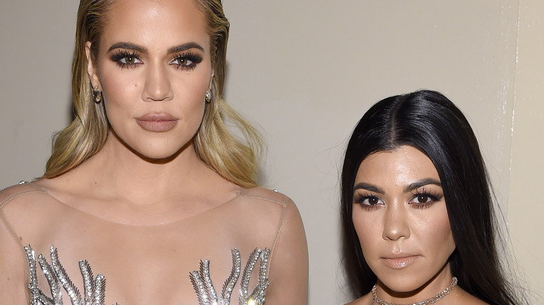 Khloé Kardashian and Kourtney Kardashian in 2016