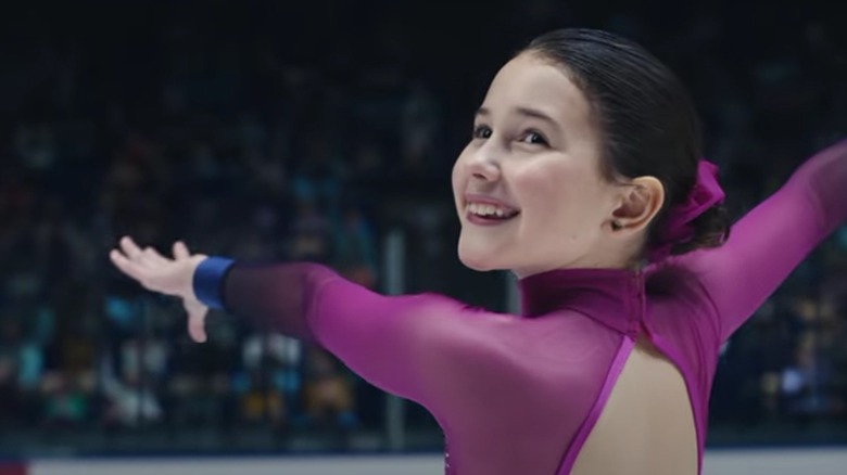 girl smiling ice skating