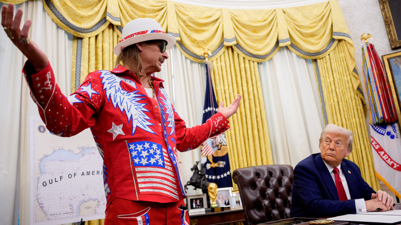 Donald Trump looking at Kid Rock