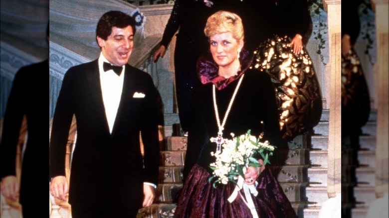 Princess Diana walking in cross necklace