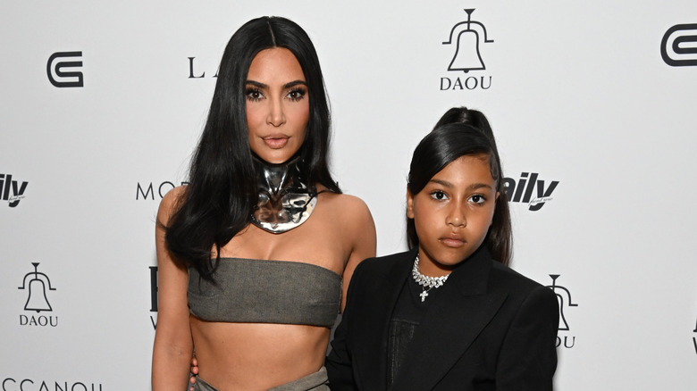 Kim Kardashian and North West pose at fashion awards