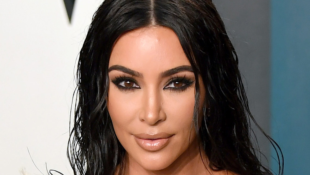 Kim Kardashian with middle part at an event