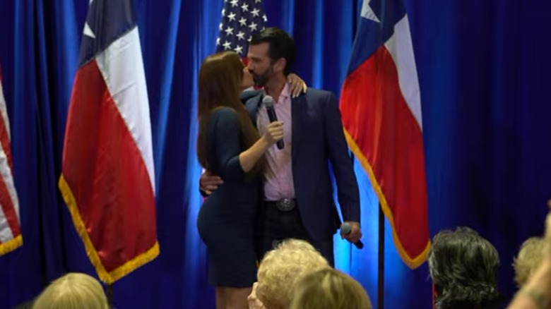 Donald Trump Jr. kissing Kimberly Guilfoyle with his eyes open