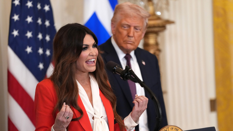 Donald Trump staring at Kimberly Guilfoyle while she's delivering a speech in a red blazer