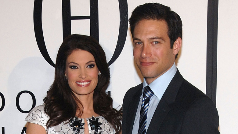 Kimberly Guilfoyle and Eric Villency smiling.