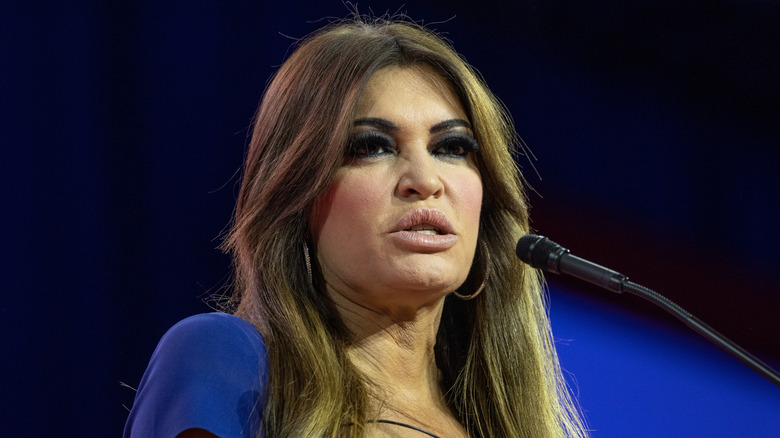 Kimberly Guilfoyle stands at a microphone