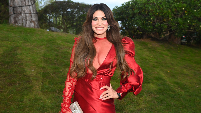 Kimberly Guilfoyle low-cut red gown Cannes AmFAR