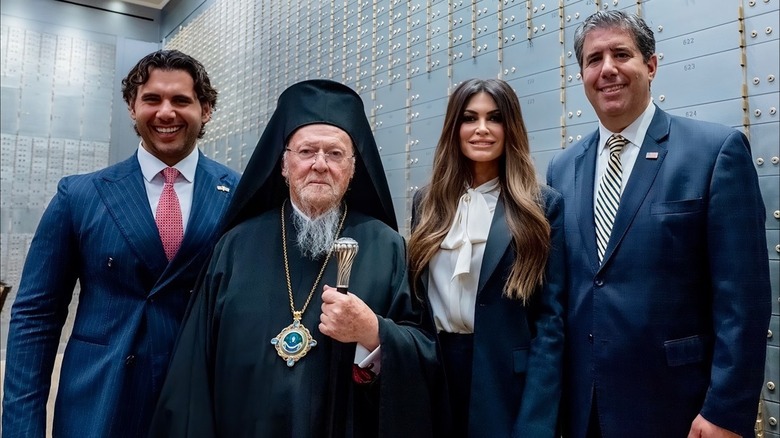 Kimberly Guilfoyle smiling with a group of people