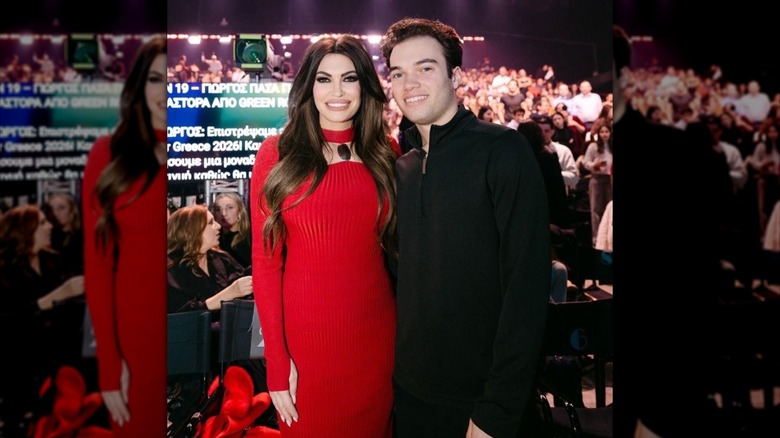 Kimberly Guilfoyle smiling with her son