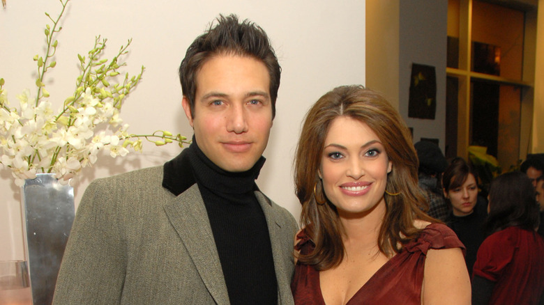 Kimberly Guilfoyle posing for photos with Eric Villency