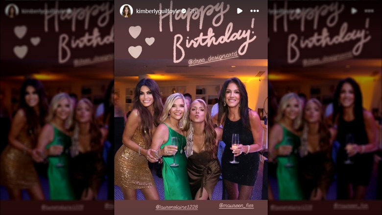 Kimberly Guilfoyle posing with friends