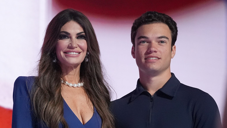 Kimberly Guilfoyle smiling next to her son Ronan Villency at the Republican National Convention.
