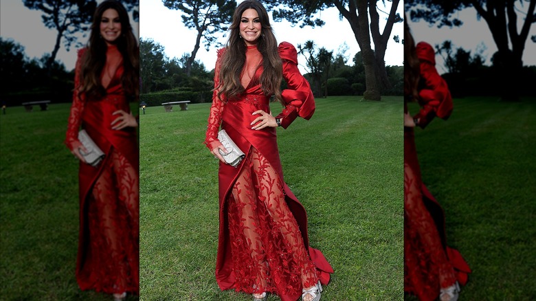 Kimberly Guilfoyle sheer red dress AMFAR 2025