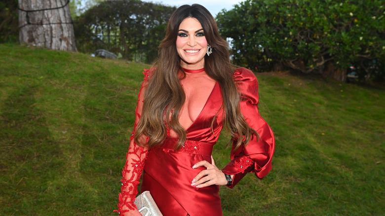 Kimberly Guilfoyle wearing red dress at amFAR Gala