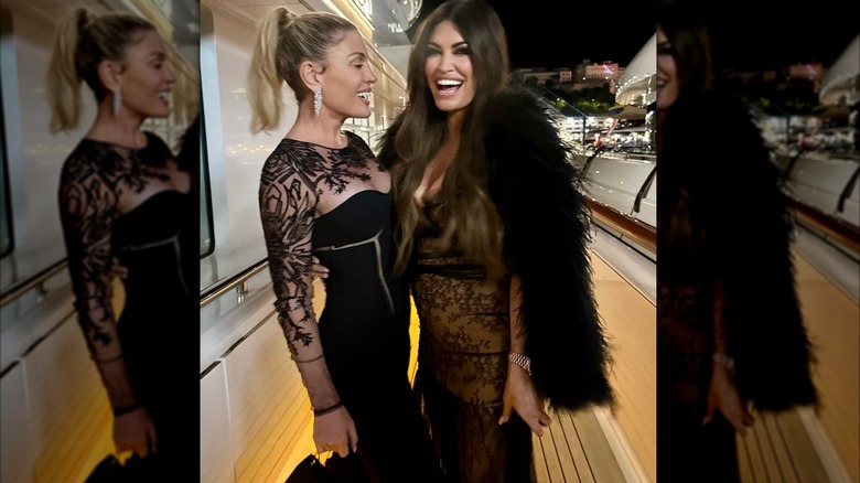 Kimberly Guilfoyle laughing with woman on a boat