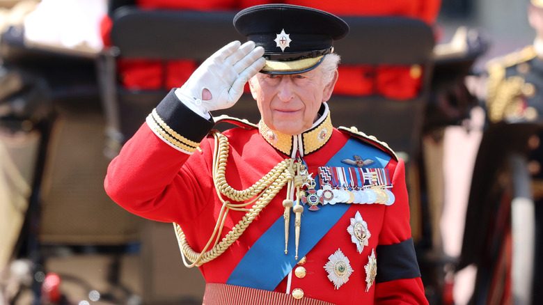 King Charles III saluting during Trooping the Colour 2025