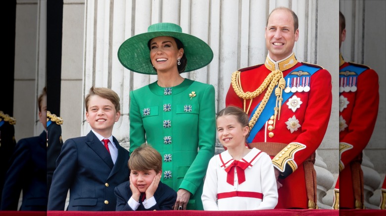 Prince William and Kate Middleton smile with their three kids