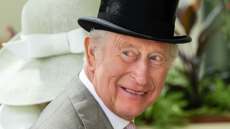 King Charles III smiling