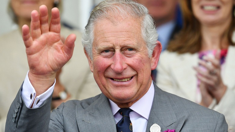 King Charles waving to the crowd