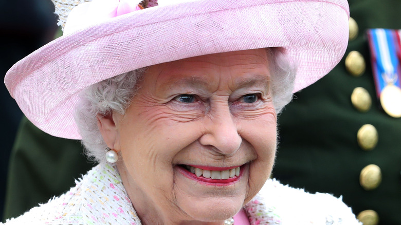 Queen Elizabeth in a pink outfit