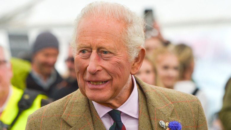 King Charles III smiling