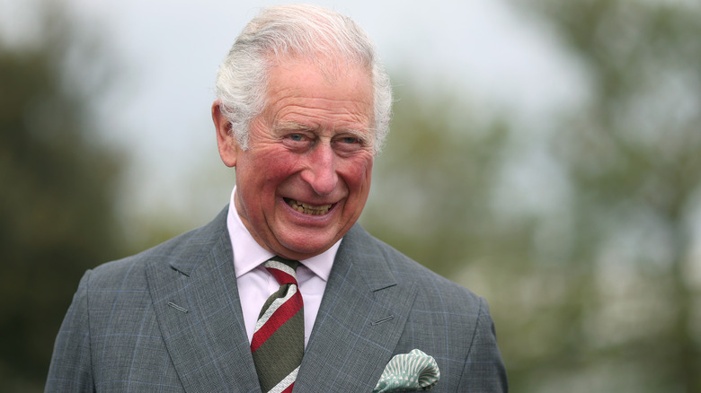 King Charles laughing