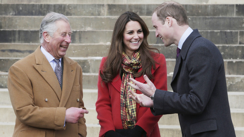 King Charles II, Prince William and Princess Catherine laughing
