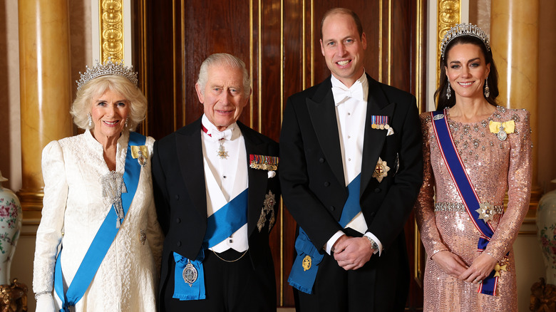 Camilla, Charles, William and Catherine posing together