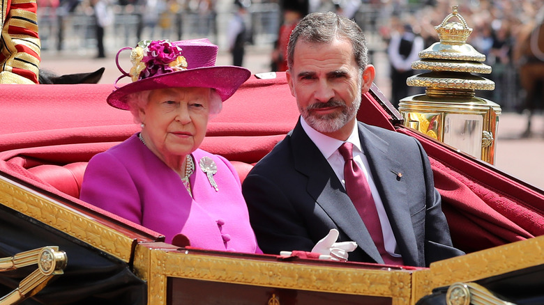 King Felipe of Spain and Queen Elizabeth looking thoughtful