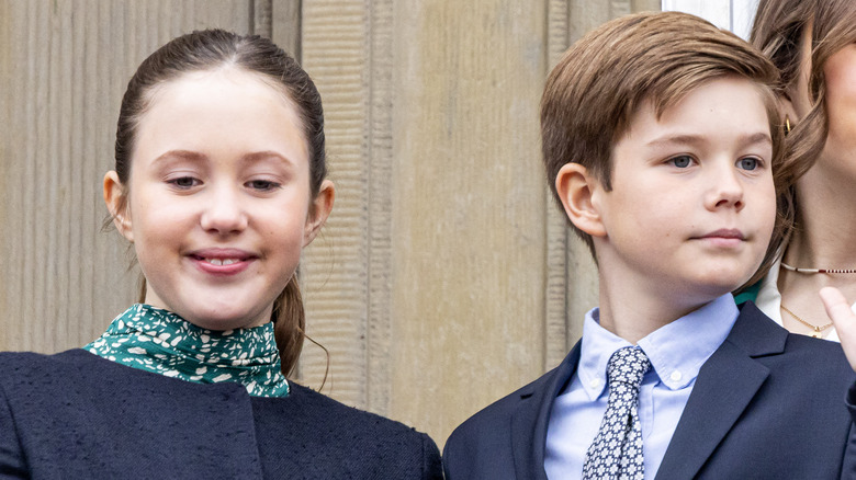 Princess Josephine and Prince Vincent standing on the royal balcony in 2023