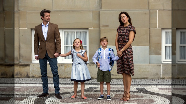 King Frederik and Queen Mary of Denmark accompany Prince Vincent and Princess Josephine on their first day of school in 2017