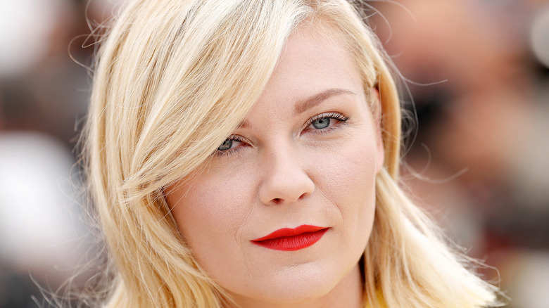 Kirsten Dunst poses at an event