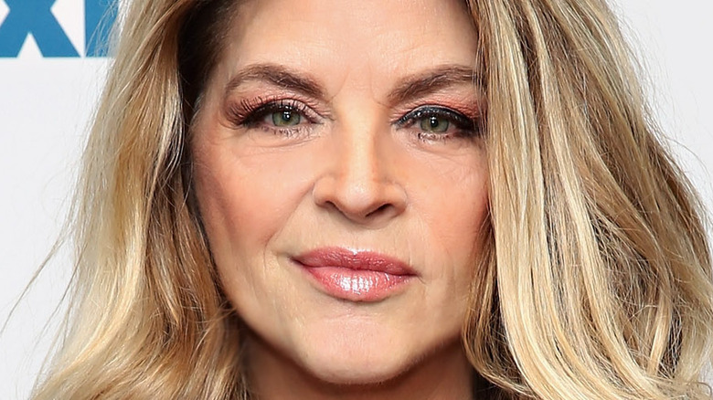 Kirstie Alley poses on the red carpet