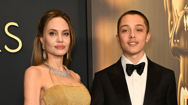 Angelina Jolie and Knox Jolie-Pitt posing together red carpet