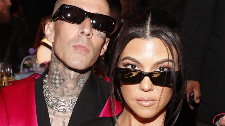 Kourtney Kardashian and Travis Barker at the 2022 Grammys