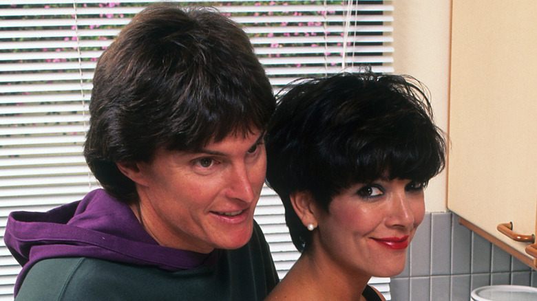 Kris Jenner posing with then-husband in the kitchen