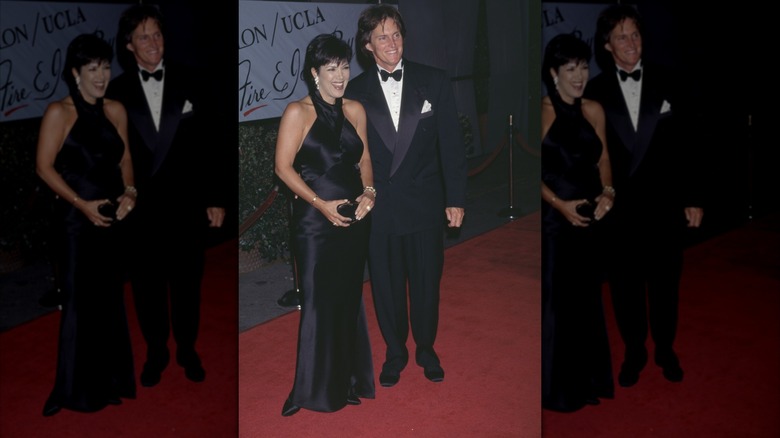 Kris Jenner in a black gown, posing next to Caitlyn Jenner