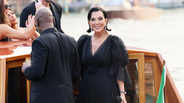 Kris Jenner smiling on a boat in Venice, Italy