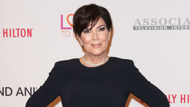Kris Jenner posing on step-and-repeat