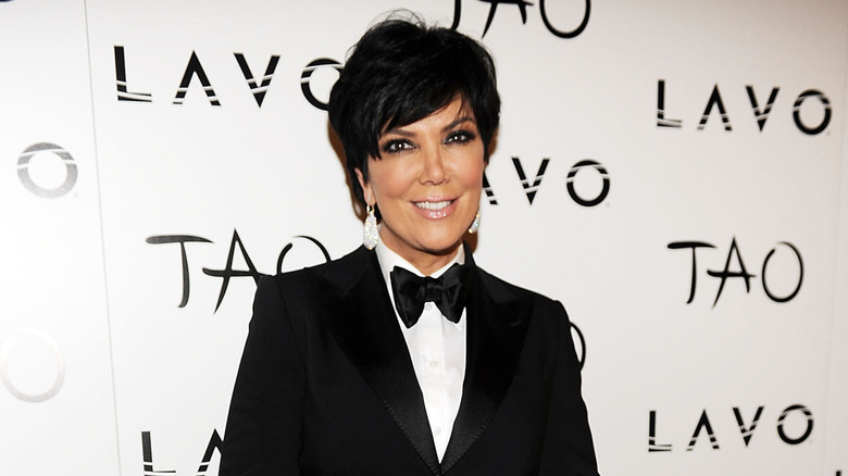 Kris Jenner posing on step-and-repeat