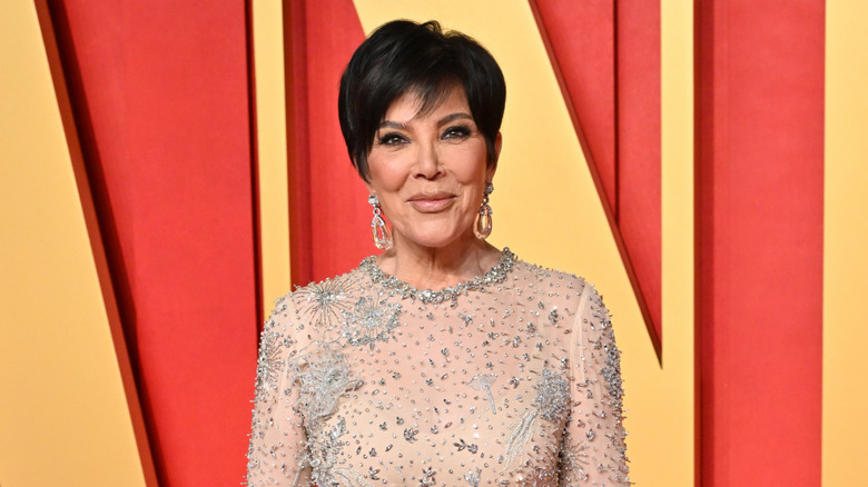 Kris Jenner posing at the 2024 Vanity Fair Oscar Party