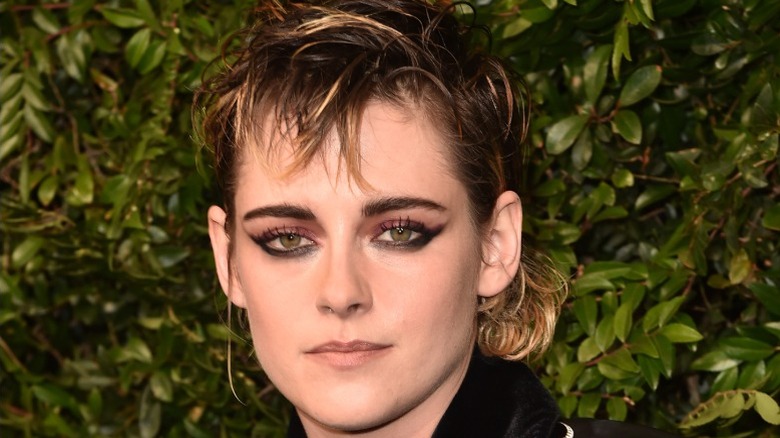 Kristen Stewart at a pre-Oscars party with a short mullet style