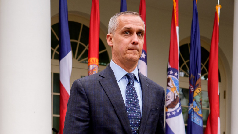 Corey Lewandowski walking outside White House