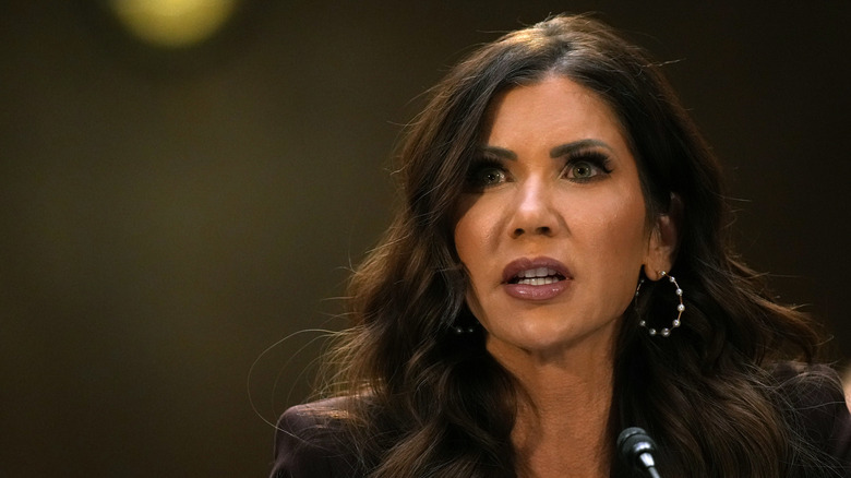 Kristi Noem speaking with microphone