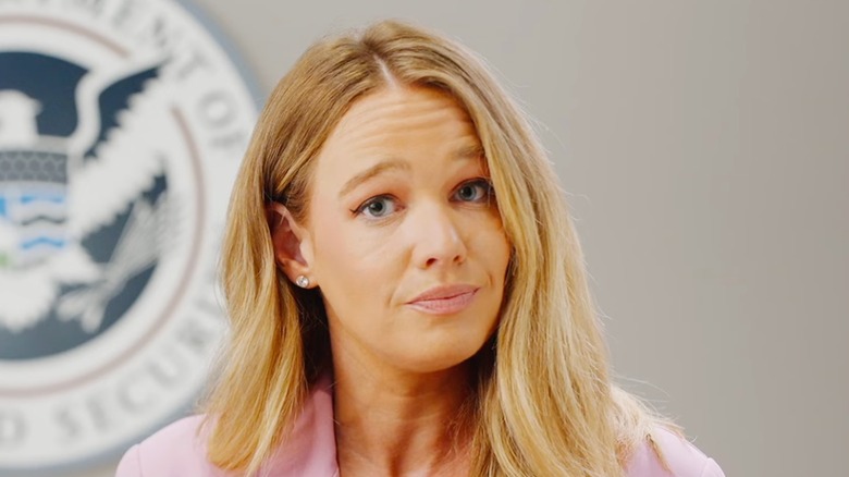 Tricia McLaughlin pink shirt looking at camera