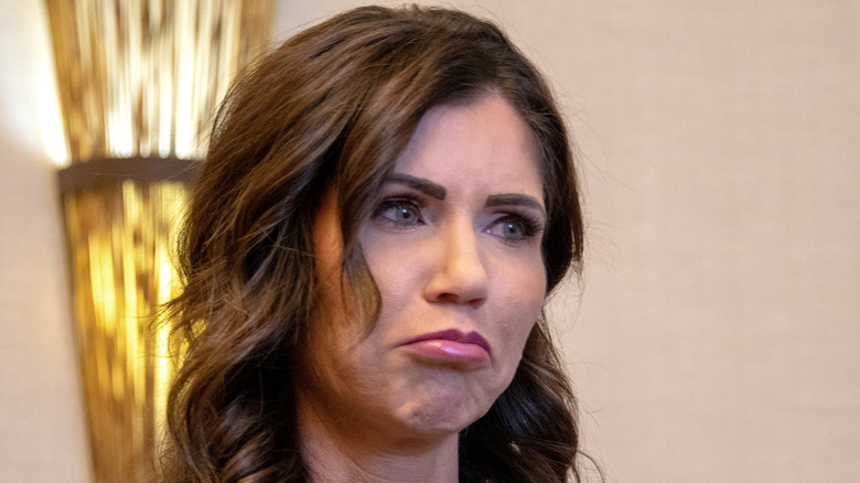 Kristi Noem frowning