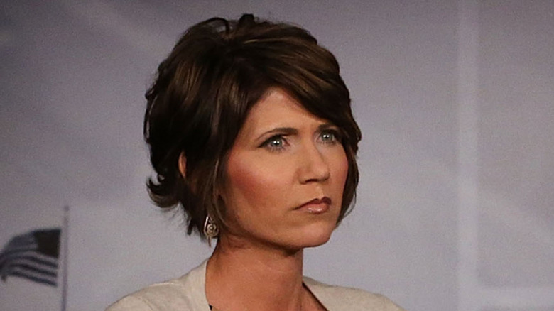 Kristi Noem looking serious with a bob haircut